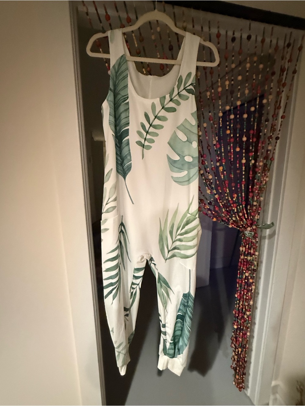 Women's White Tropical Leaf Jumpsuit with large front pockets